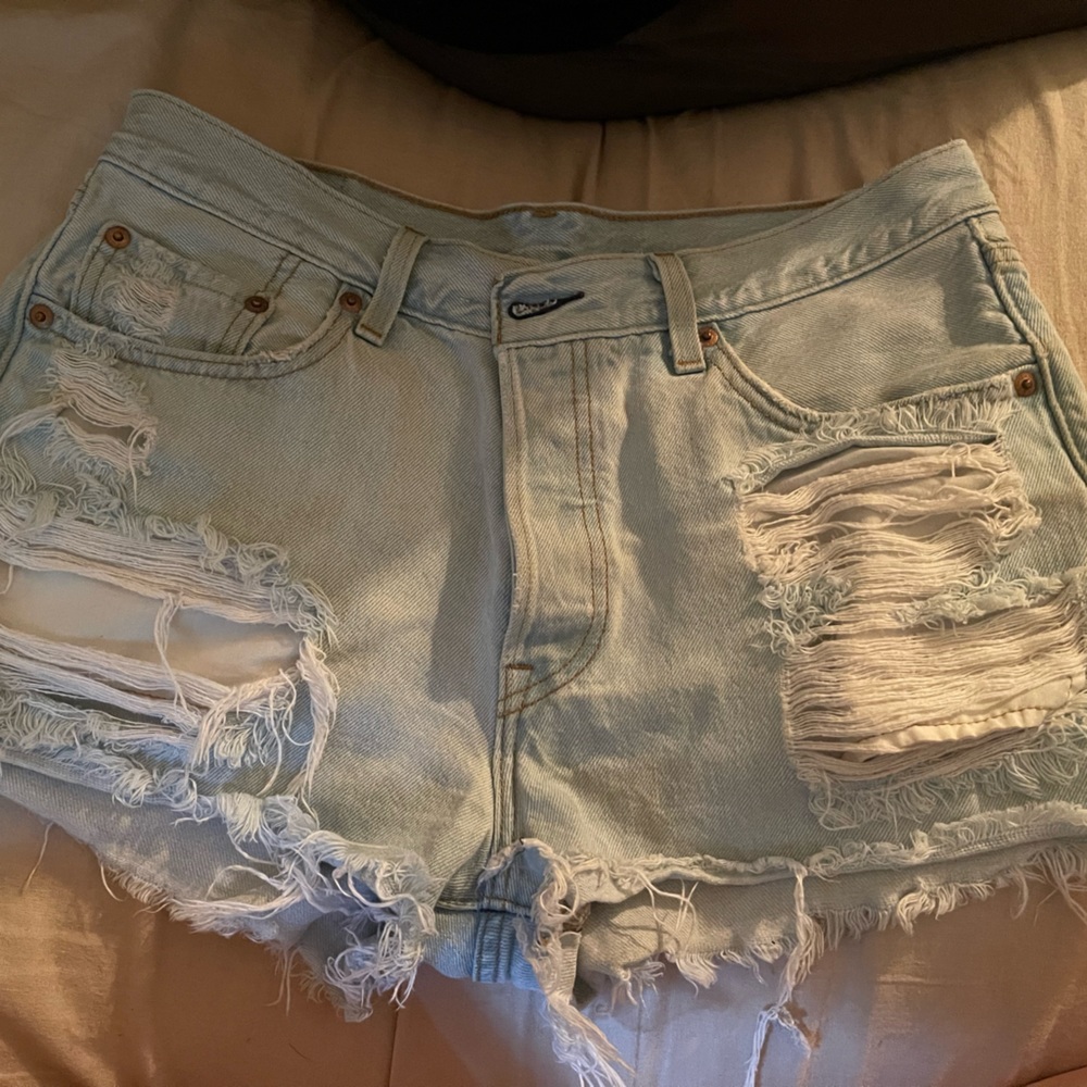 Levi’s light wash medium rise distressed shorts
